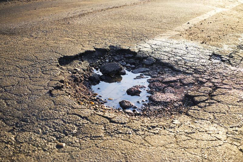 Asphalt Pothole Filling in Orange County, CA